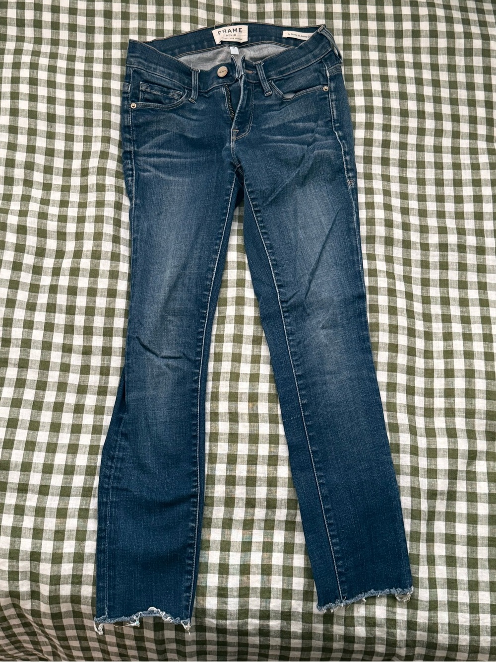 Frame Denim Indigo Skinny Jeans with Raw Hem